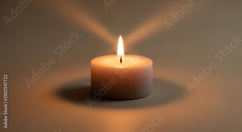 lit candle, warm light, single flame, soft glow, peaceful ambiance