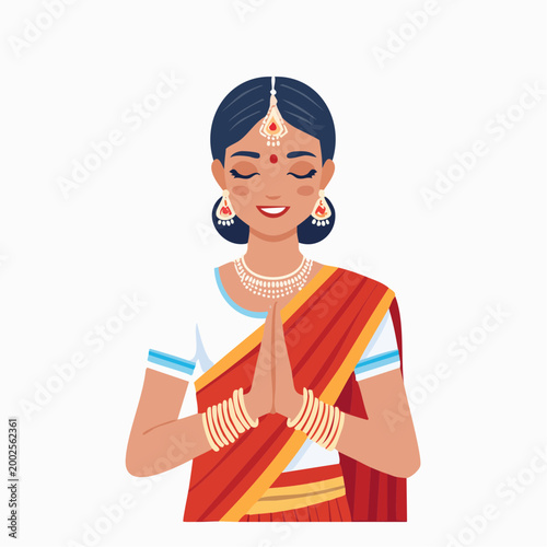 Indian Woman in Traditional Attire Offering Namaste