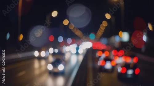 City Lights at Twilight: An artistic representation of a city at twilight, featuring blurred car headlights and streetlights creating a captivating bokeh effect on the road. Generative AI.