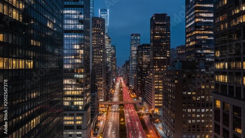 Cityscape at Dusk: The cityscape awakens as the day fades into night, illuminating skyscrapers with a warm glow. Capturing the dynamic energy and architectural brilliance of urban life. Generative AI.