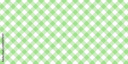 Diagonal light green gingham checkered pattern background with seamless mint textured fabric effect for picnic or textile decor.