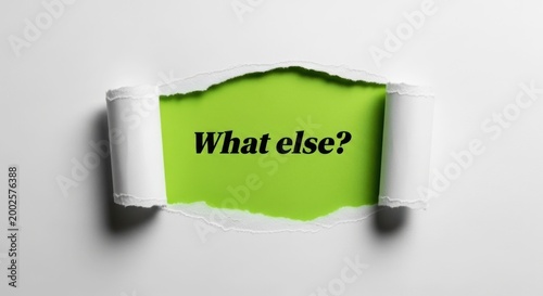 What else question on green background behind torn paper.