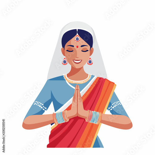 Indian Woman in Traditional Attire Performing Namaste Gesture