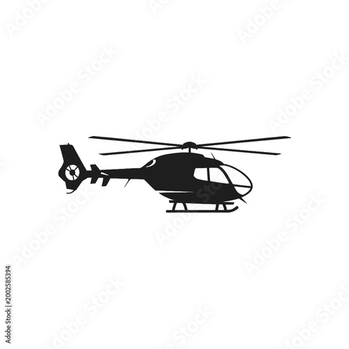Bild auf Leinwand Black helicopter silhouette in flight.