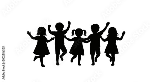 Silhouette of a group of happy children dancing and playing together.