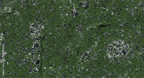 Green speckled granite texture abstract background with natural stone pattern for design and decor seamless surface