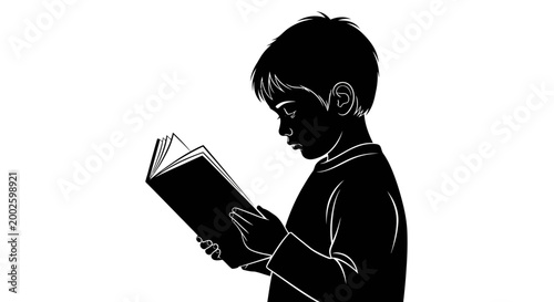 A young boy reading a book in black and white silhouette style.
