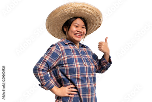 Photos Cheerful young Asian farmer woman giving thumbs up