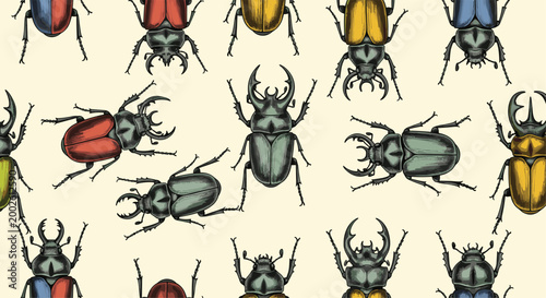 Seamless vector pattern featuring various colorful stag beetles with long mandibles displayed on a pale yellow vintage style background.