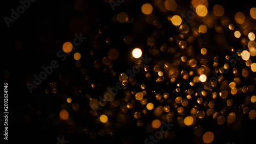 Gold Bokeh Lights on Black Background