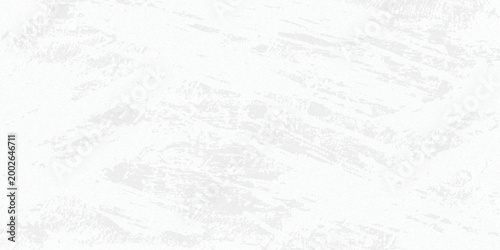 White old concrete wall grunge texture - wide banner format background with copy space for text. Grunge gray texture of chips, cracks, scratches. Soft white grunge. Distressed black grunge texture.