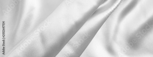 Black and white fabric background. Wrinkled cloth texture