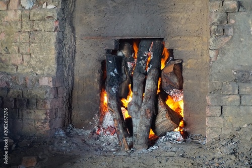 Obraz na płótnie Charcoal Kiln With Burning Wood