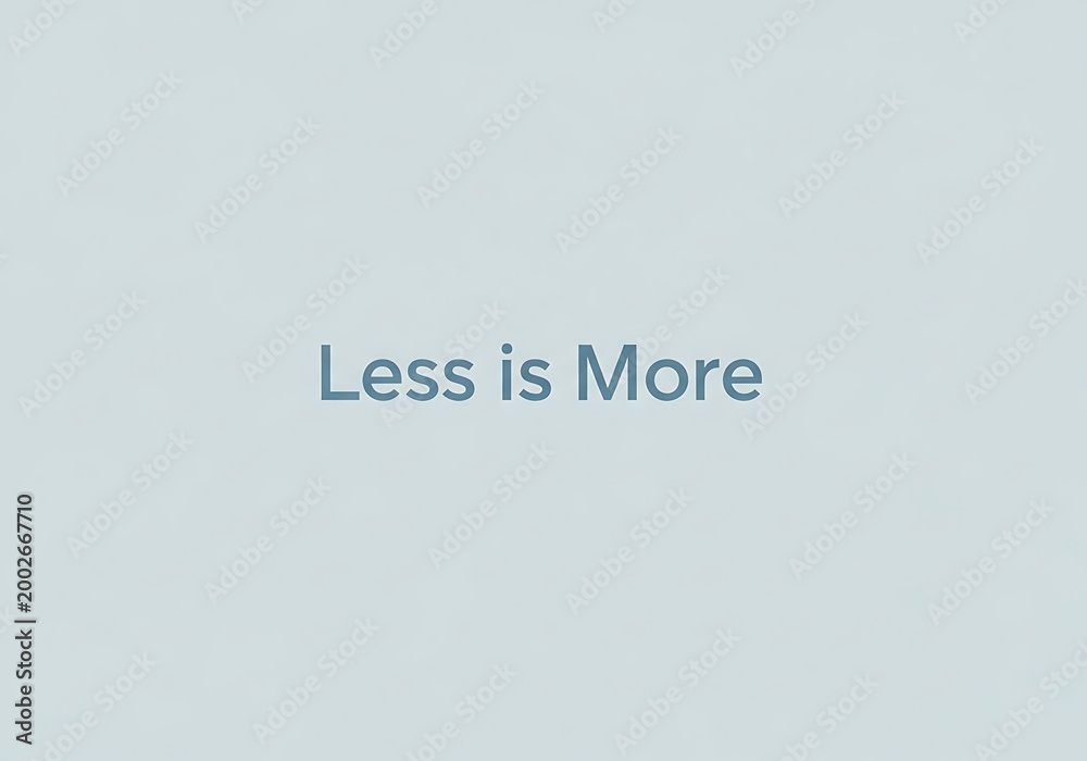 Fototapeta premium Minimalist text graphic 'less is more' on a light gray background