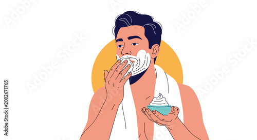 Young man applying white shaving foam to his face preparing for a clean shave in his morning grooming routine.