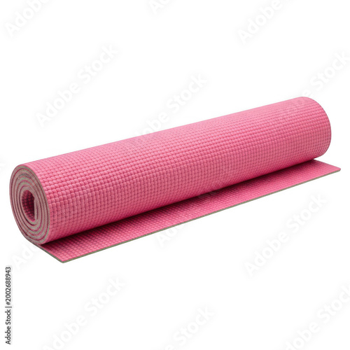 Pink yoga mat rolled out on the floor