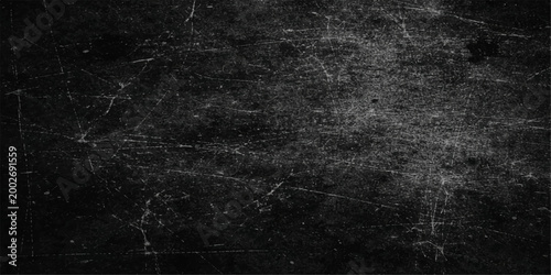 The intriguing image displays an aged, textured dark background, with the surface appearing to be distressed or worn, possibly representing age or damage. 