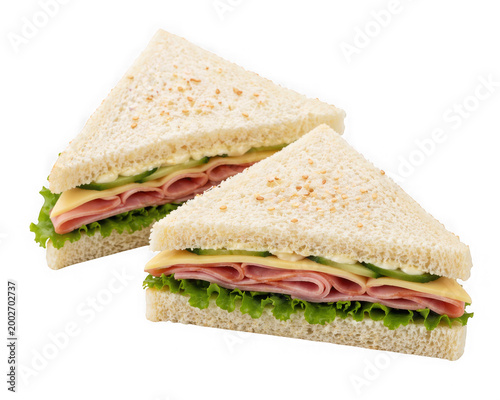 Two halves of a ham and cheese sandwich on transparent background