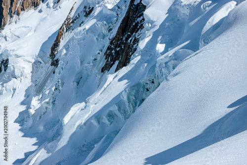 Tableau sur toile Dramatic glacier icefall and crevasses on steep alpine mountain slope Saint-Gerv