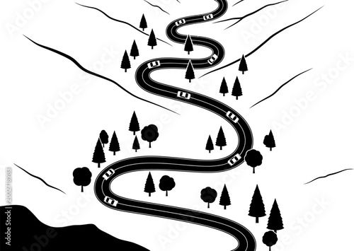 Roadway winding through a mountainous landscape depicts a long journey ahead for travelers seeking new adventures in the wilderness.