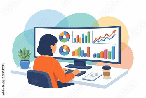 Woman analyzing data on a wide monitor at a modern home office