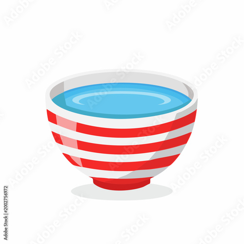 Red and White Striped Bowl Filled with Blue Liquid