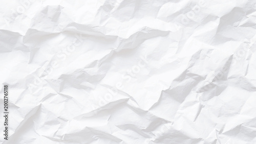Crumpled white paper texture background with creases and folds abstract