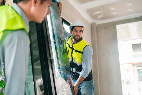 Canvastavla Construction worker safety helmet protective vest window installation indoor ren
