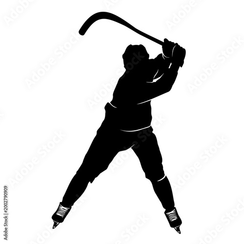 Silhouette of a bandy player swinging stick for a shot