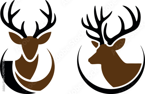 Two stylized deer heads with antlers facing opposite directions on circular badges