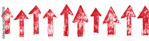 A set of handdrawn symbols consisting of red arrows pointing up and grunge red arrows isolated on a transparent or white background.