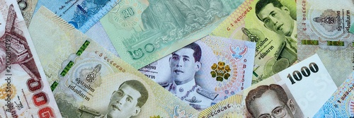 Konstfotografi Thai baht money banknotes pile on table