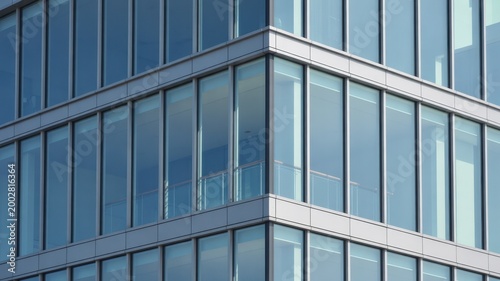 Modern office building exterior facade with glass curtain wall architecture