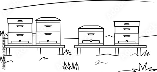 Simple line of beehives a wooden stand in a field apiary beekeeping nature