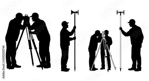 Surveyors working with measuring equipment.