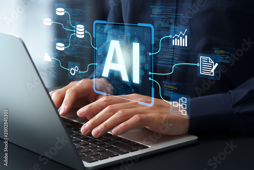 AI engineering. Development and integration of artificial intelligence into business systems. Engineer building AI pipelines on laptop computer.