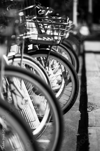 The street bikes are lined up in a row. 