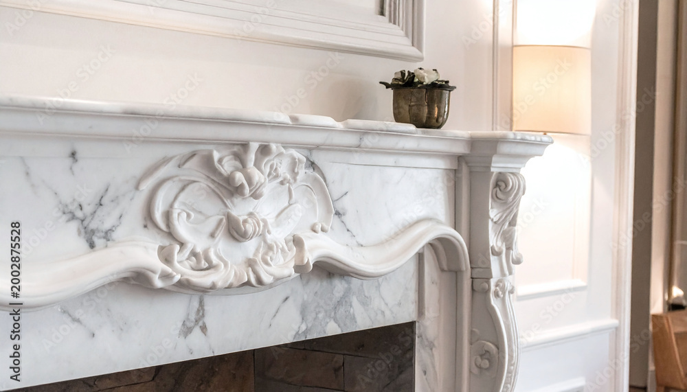 Fototapeta premium Elegant white marble fireplace featuring intricate floral carvings and classic style. A symbol of luxury home decor, perfect for premium interior design and architectural marketing projects.