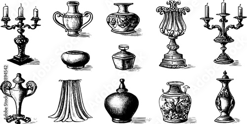 Assorted urns and candlesticks arranged on plain background