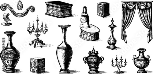 Assorted decorative vases and candelabra on empty backdrop