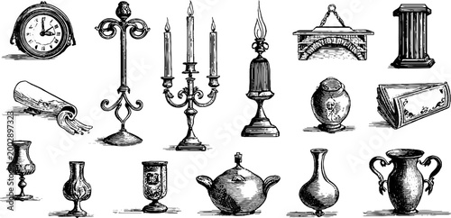 Vintage tabletop vessels and candlesticks displayed on white background