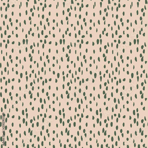 Minimalist seamless vector pattern featuring hand drawn olive green brush strokes and dots on a muted off white background. Artistic abstract texture with organic spots and noise effect. Trendy earthy