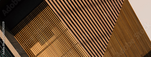 modern gray cement and wood panel in detail of architecture banner background