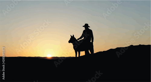 man riding donkey at sunset silhouette landscape