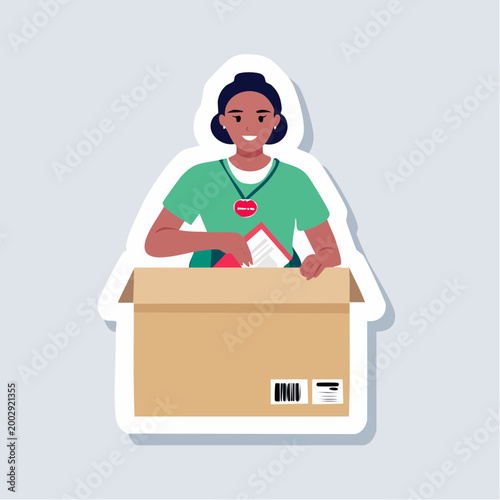 Volunteer packing donation box