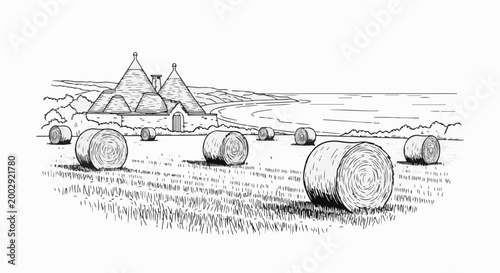 Rural landscape with conical houses, hay bales in a field, and coastline in background