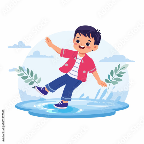 Boy happily splashing in a puddle