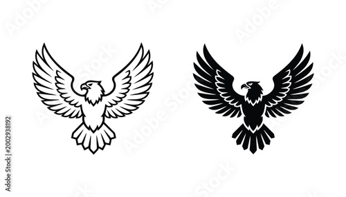 Majestic eagle flying with wings spread wide vector icon set showing detailed bird of prey in line art and solid black silhouette styles for heraldry and emblem design