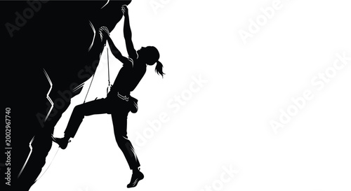Rock climber silhouette reaching for hold on a black wall