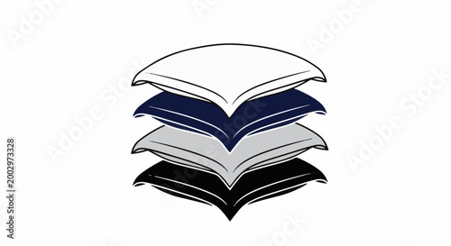 Stacked pillows in white, navy, gray, and black